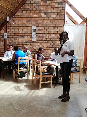  Robinah, Saraya Uganda Lead Hygiene Manager, acting as the moderator of the event.